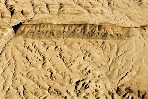 Dyke: Drainage patterns blocked by a black dolerite dyke