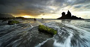 Gloomy: Dramatic cloud atmosphere with rock formation at