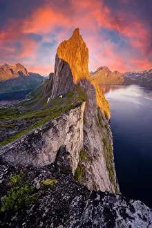Segla: Dramatic clouds, evening mood, steep mountain Segla