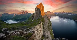 Segla: Dramatic clouds, evening mood, steep mountain Segla