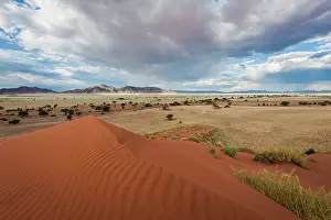 Excelsior: Dramatic clouds over the Namib Rand in the afternoon