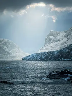 Lighting: Dramatic lighting mood in the clouds above the winterly