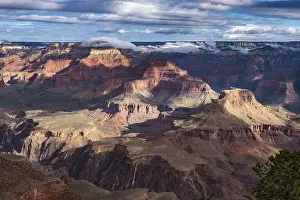 Lights: Dramatic play of light in the Grand Canyon under a cloudy sky