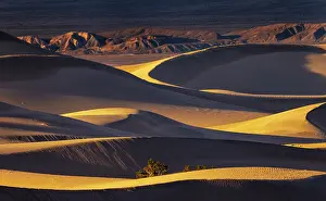 Chuck Haney: Dramatic sunset light on the Mesquite Sand Dunes in Death
