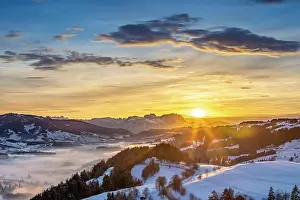 Dreamlike: Dreamlike winter landscape at sunset with a view
