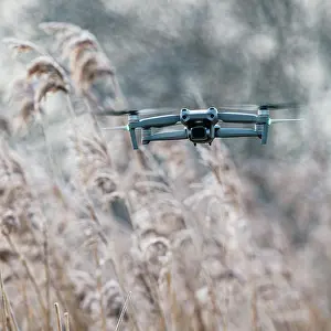 Technical: Drone in flight over marshland, Devon, England