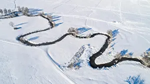 Winding: Drone shot of the river Schmutter meandering naturally
