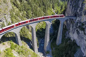 Track: Drone shot of train passing the Landwasserviadukt