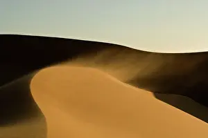 Windswept: Dunes in late afternoon light - with sand blowing