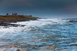 Dunstanburgh: Dunstanburgh Castle - stormy North Sea - autumn