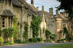 Cottages: Early morning over connected cottages in Burford
