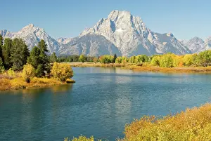 Oxbow: Early morning sun on Grand Teton range from oxbow bend