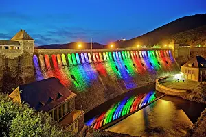 Artificial: The Edersee dam wall illuminated by LED spotlights