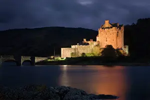 Donan: Eilean Donan Castle - being lit up at dusk - November