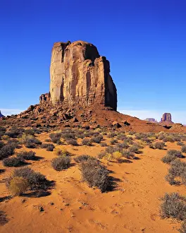 Isolation: Elephant Butte seen across the desert-floor with