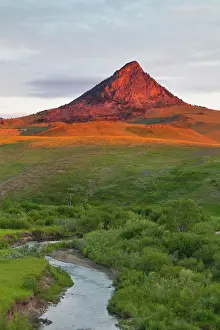 Foothills: Elk Creek runs below Haystack Butte at first
