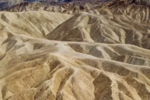 Gower: Eroded badlands at Gower Gulch seen from Zabriskie Point