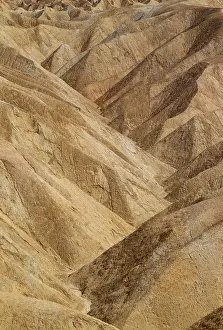 Gower: Eroded badlands at Gower Gulch seen from Zabriskie Point