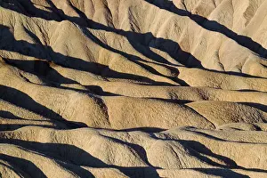 Gower: Eroded badlands at Gower Gulch seen from Zabriskie Point