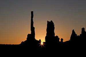 Nevada: The eroded rock formations Totem Pole and Yei Bi Chei at sun