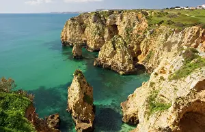 Ponta: Eroding cliffs, stacks and islets at Ponta da Piedade