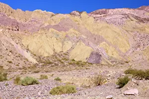 Shades: Erosion - eroded mountain cliffs in shades of yellow