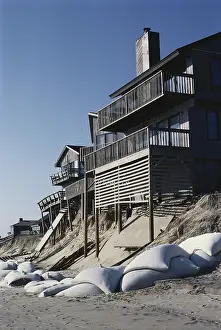 Threatens: Erosion Threatens Beach Houses
