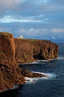 Ness: Esha Ness cliffs and lighthouse along cliffs edge