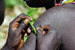Razor: Ethiopia - scarification ritual among Surma: tribe