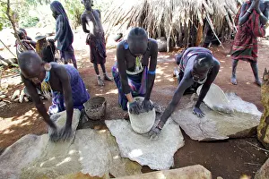 Grinding: Ethiopia - Surma Woman: tribe of south west Ethiopia