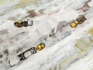 Lorry: Excavator and lorries and at a harvesting pan of the Walvis Bay Salt works