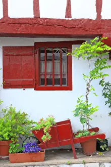 Container: Facade of a house decorated in the Basque village
