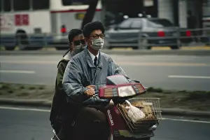 Motorbike: Face Mask in Polluted City