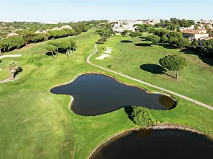 Housing: Fairway framed by housing estates at the Islantilla