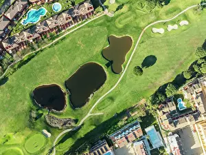 Housing: Fairway framed by housing estates at the Islantilla