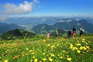 Childhood: Family hiking on the summit panorama trail of the