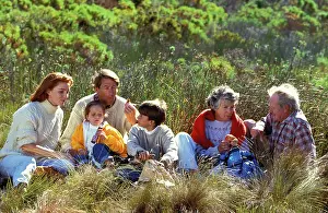 Picnic: Family - parents, children and grandparents having picnic