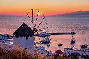 Port: Famous traditional Greek windmill overlook port