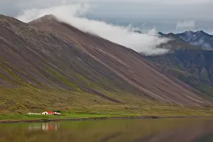 Absence: Farm next to mountains and lake, Iceland