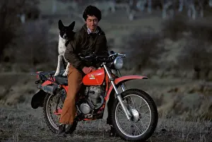 Motorcycle: Farmhand and his dog on motorcycle. near Goulburn