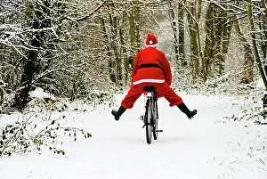 Bikes: Father Christmas - on a bicycle, freewheeling