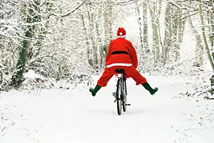 Bikes: Father Christmas - on a bicycle, freewheeling