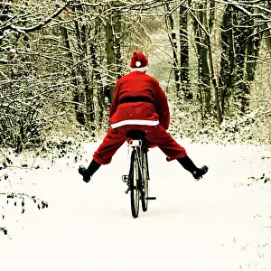 Bikes: Father Christmas - on a bicycle - freewheeling