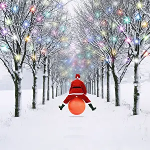 Claus: Father Christmas bouncing on a space hopper through