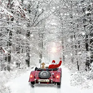 Waving: Father Christmas, in car waving goodbye with