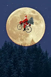 Bikes: Father Christmas - flying on his bicycle past a
