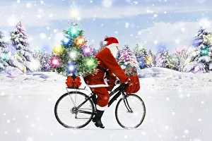Bicycles: Father Christmas riding bicycle through winter snow scene