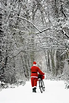 Bikes: Father Christmas - in snow - with bicycle