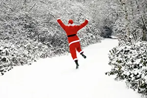 Footpaths: Father Christmas - in snow covered avenue