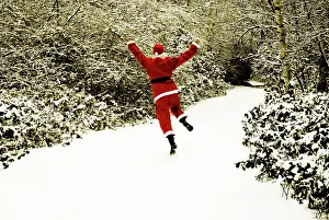 Footpaths: Father Christmas - in snow covered avenue